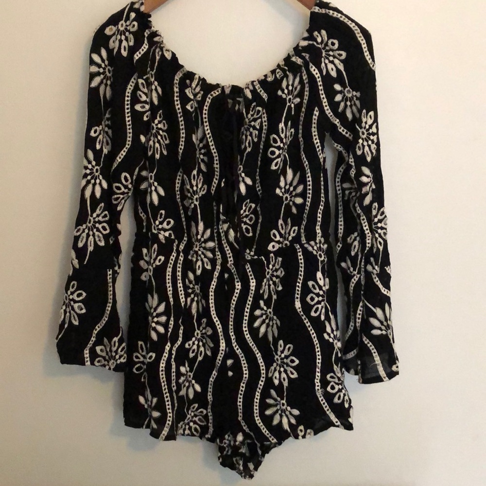 Embroidered black and white bell-sleeve romper